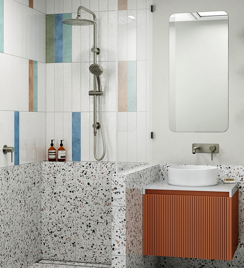 A bathroom with brushed gold finish showers, single towel rail, spout and mixer, and a white bathtub on the side.