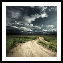 Road into Stormy Clouds Framed Print