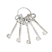 Five Antique White Keys on Ring Ornament