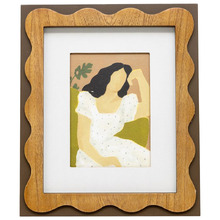Sitting Lady in White Dress Framed Canvas Wall Art