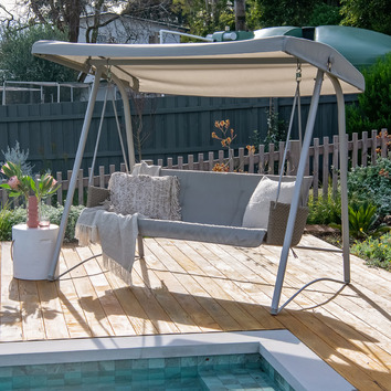 patio swing with arched canopy