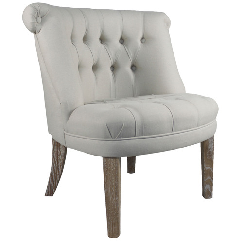 cream tufted chair