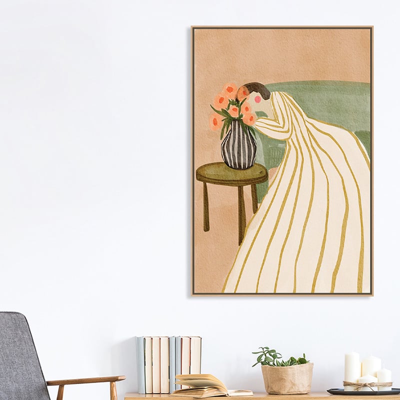 Woman Admiring Flowers Canvas Wall Art