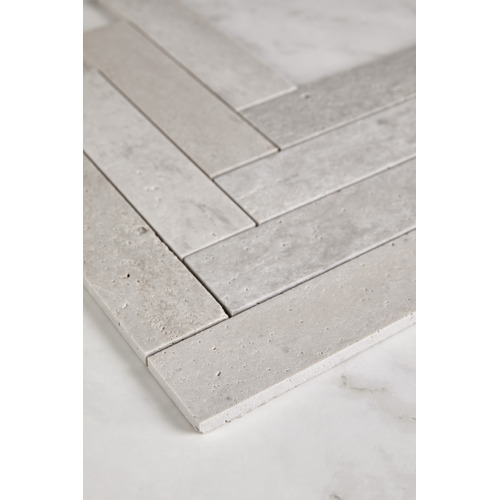 Elias Tumbled Grey Large Herringbone Travertine Mosaic Tile