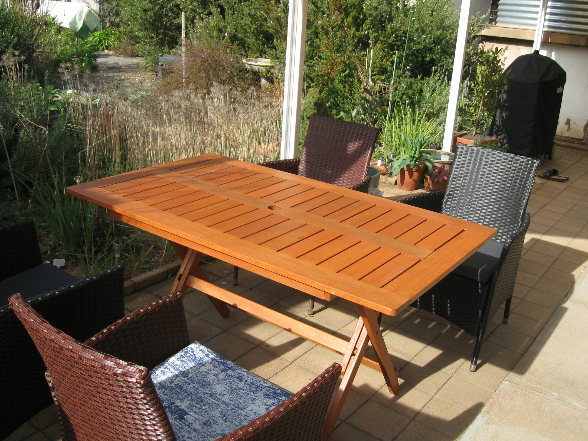 dark wood outdoor dining table