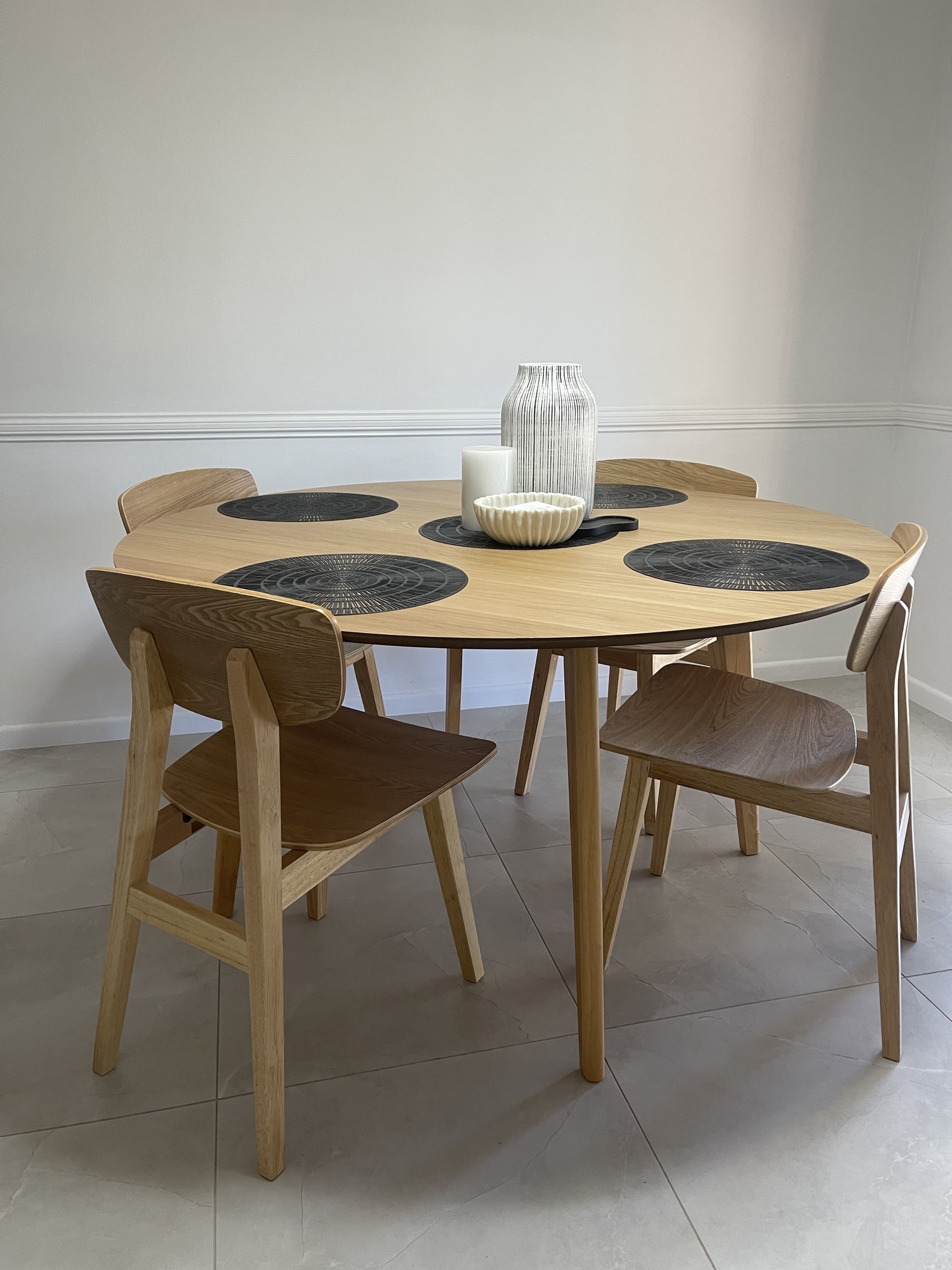 natural larsen round wooden dining table