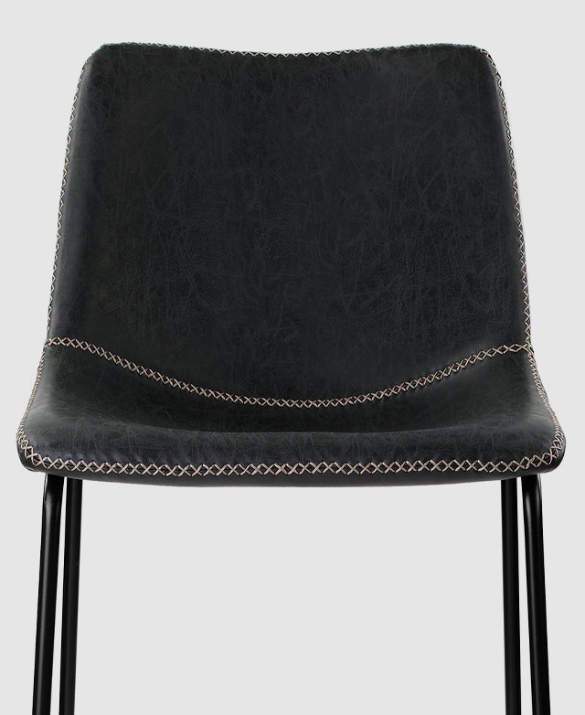 A front-facing cropped image focusses on the seat and its gentle curvature. A front-facing cropped image focusses on the seat and its gentle curvature.