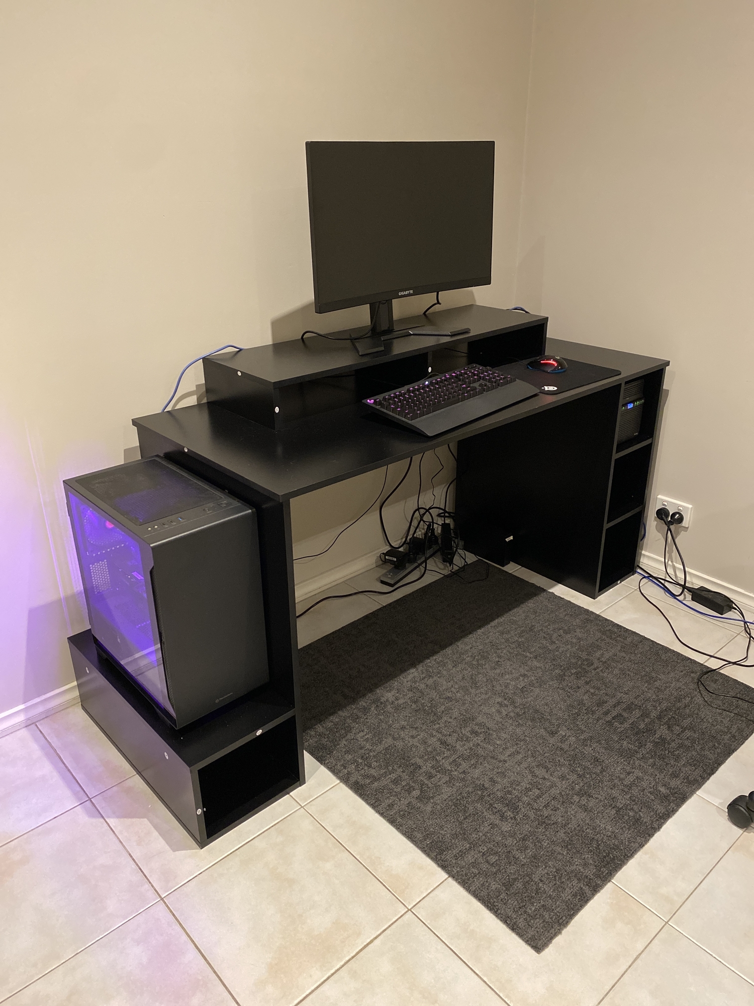 black focus gaming desk with raised shelf