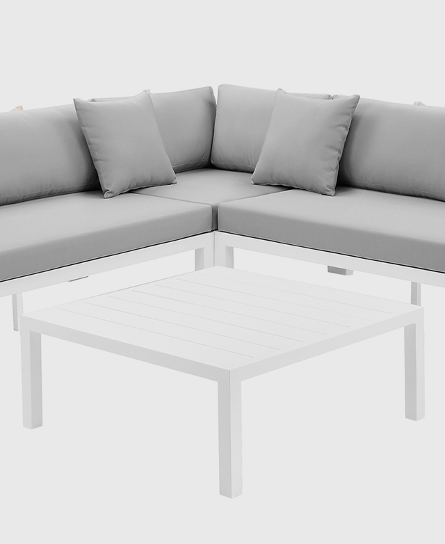 A modular corner lounge is flanked by a double lounge on either side. A coffee table is in front.