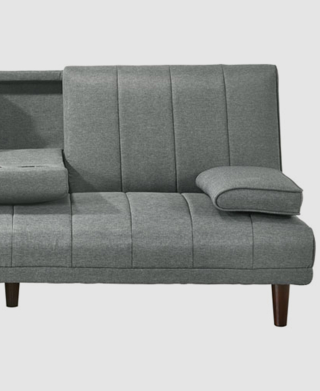 Front-facing view of a sofa with grey linen upholstery and a vertical channel stitch.
