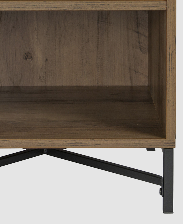 The base of a wooden bedside table; a powder-coated steel frame lifts it slightly up off the floor.