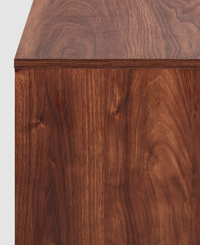 The melamine finish of the particleboard body is in focus, illustrating its beautiful wood-look texture. The melamine finish of the particleboard body is in focus, illustrating its beautiful wood-look texture.
