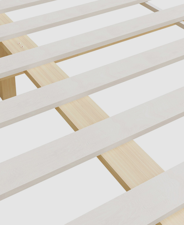 Large-scale view of the thick and sturdy flat plywood slats affixed to the base of the bed frame.