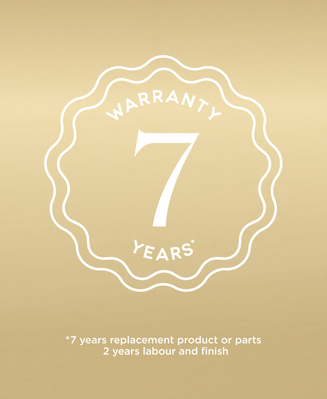 Overlay of warranty logo with 7 years warranty text on a brushed gold background