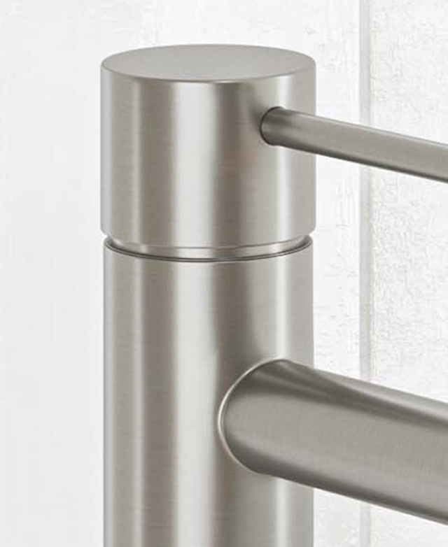 Close-up of the top part of the clovelly brushed nickel tall basin mixer with part of the body and pin lever