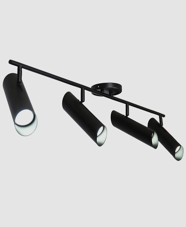 The black ceiling spotlight pendant is shown in full, with spotlights angled in different directions.