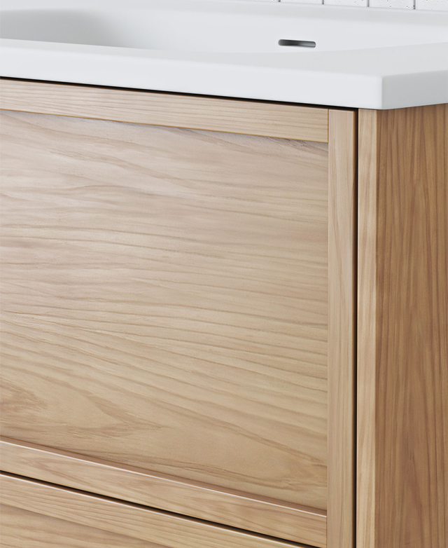 Cropped image highlights the rich warmth of the eucalyptus timber and the neat shaker-style drawer fronts. Cropped image highlights the rich warmth of the eucalyptus timber and the neat shaker-style drawer fronts.