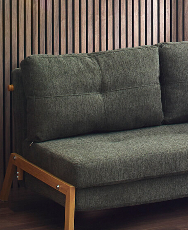 A close view of the back cushions highlight their plump form.