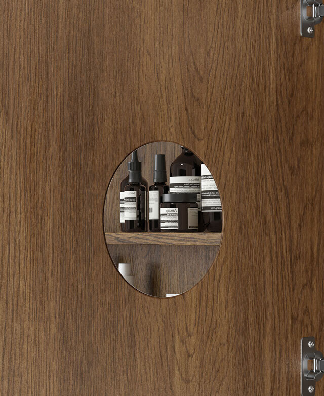 The inside of the shaving cabinet door shows a mounted, small, round 3-times magnification mirror.
