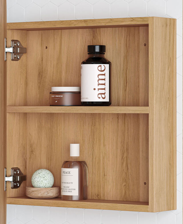 The inside of the cabinet shows the warm timber surfaces, the two shelves, and bathroom items positioned on them.