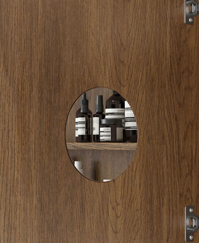 The inside of the shaving cabinet door shows a mounted, small, round 3-times magnification mirror.