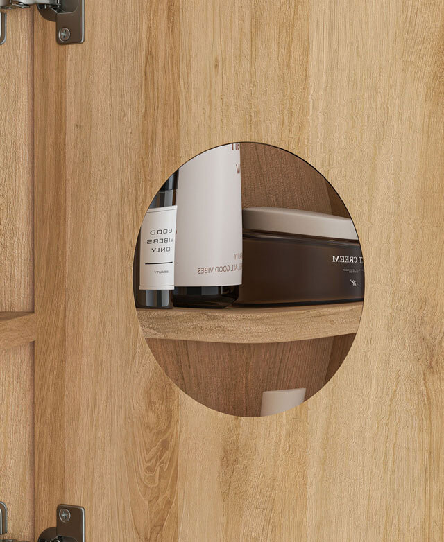 The inside of the shaving cabinet door shows a mounted, small, round 3-times magnification mirror.