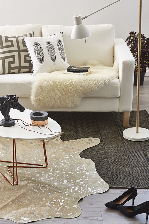 Layered rugs via Temple & Webster