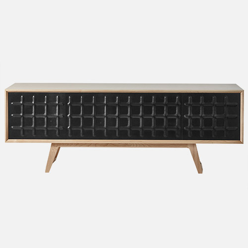 THe credenza features a vacuum pressed Italian leather front in a Canadian rock maple frame