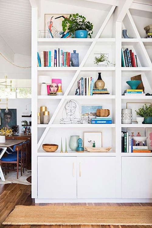 Custom shelves in Emily Henderson's LA home, via Domino.