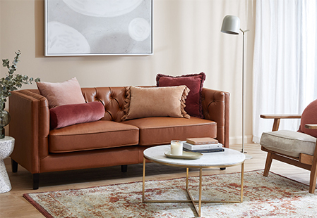 How to style a tan leather sofa