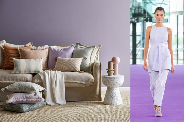 A runway model wearing a lilac tunic top and matching lilac trousers by Bondi Born next to an image of a grey lounge room with lilac cushions and a lilac feature wall