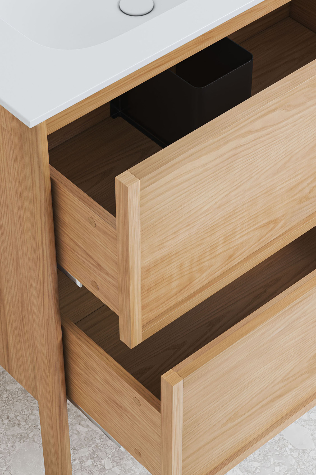 The two deep shaker-front drawers of the vanity are open to reveal generous storage space.