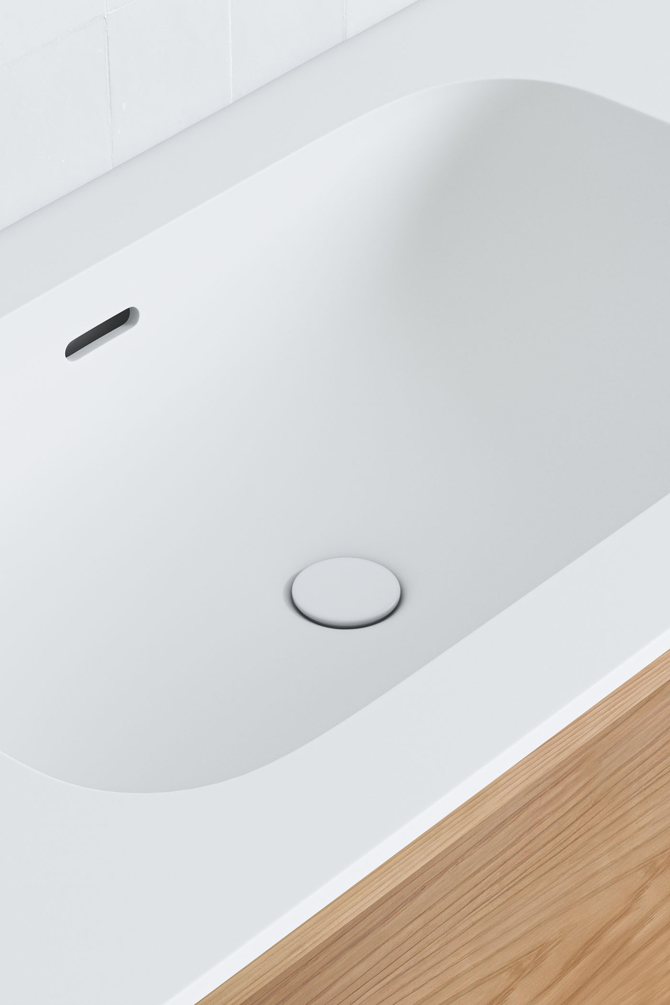 The white integrated basin and waste has crisp lines and smooth edges.