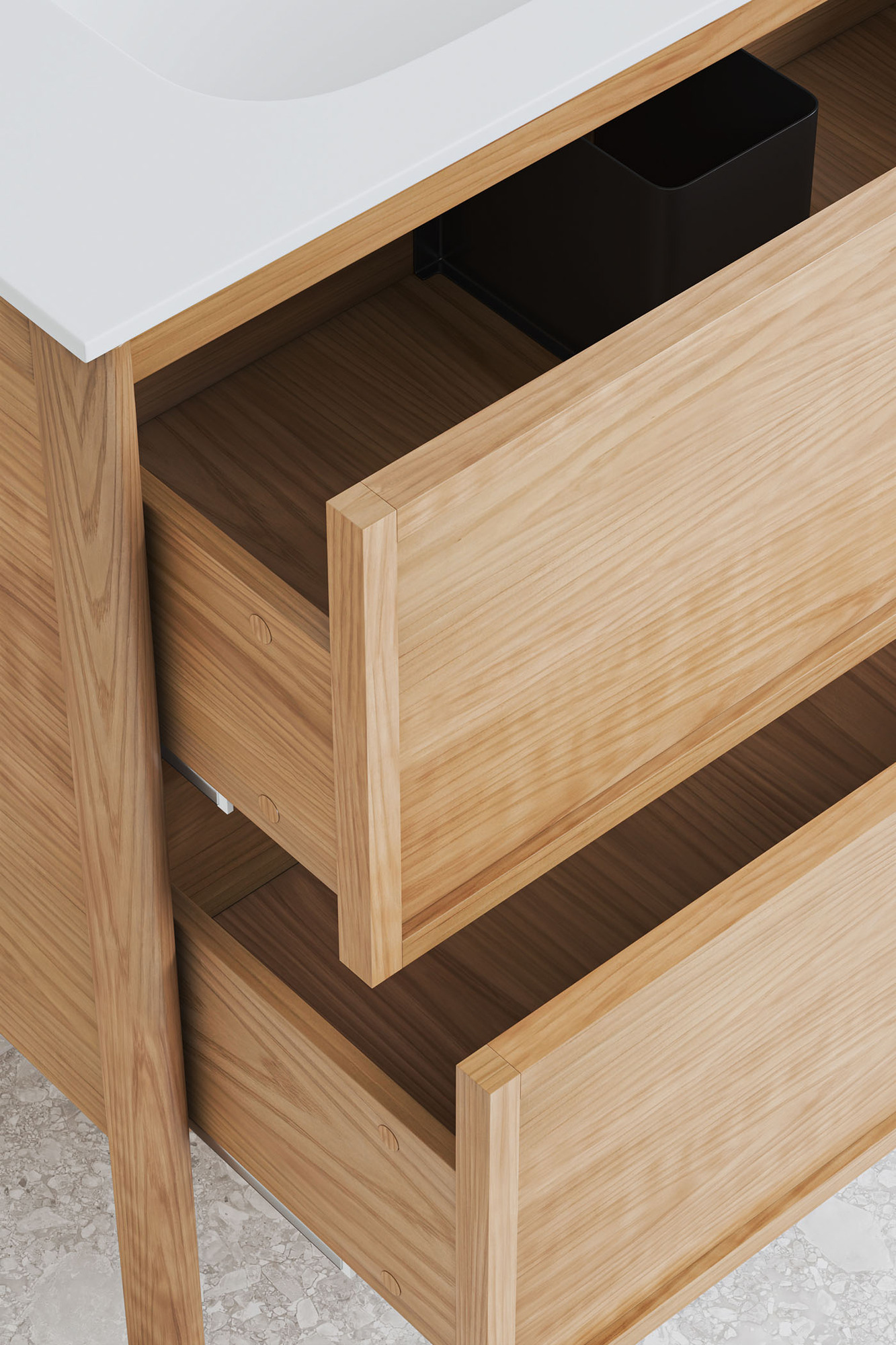 The two deep shaker-front drawers of the vanity are open to reveal generous storage space.