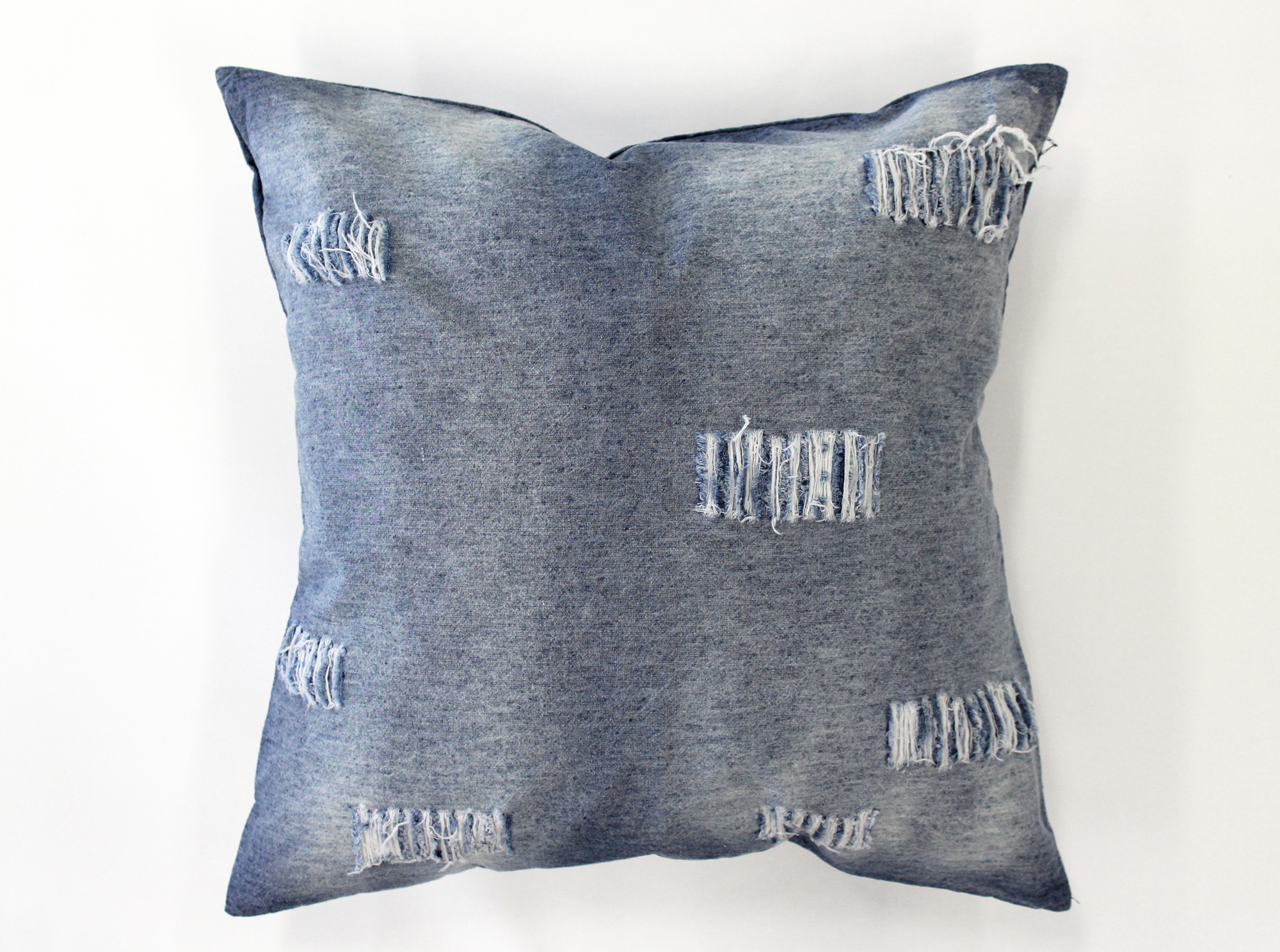 distressed denim throw pillow