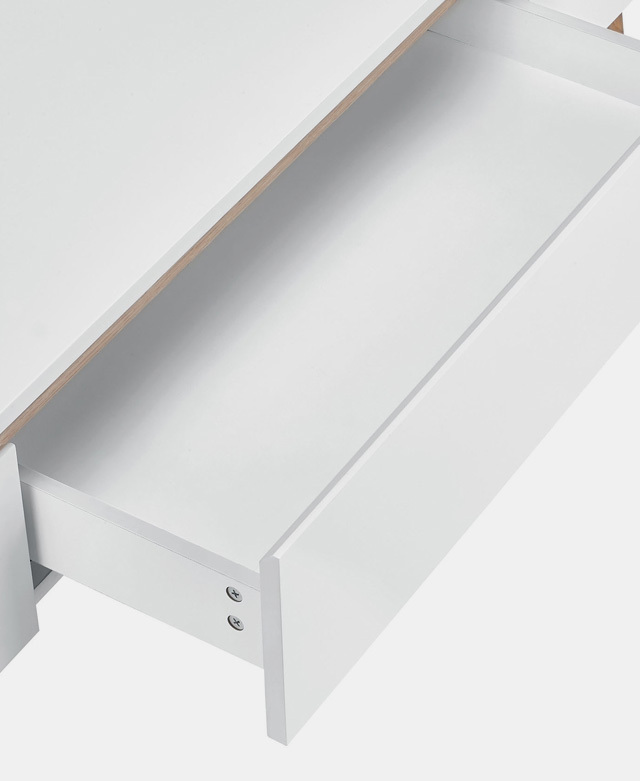 An open, empty drawer is presented from a top-down view.