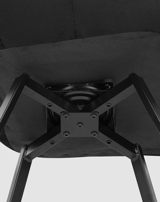 The base of the chair is viewed from underneath, revealing the swivel mechanism attached to the frame.