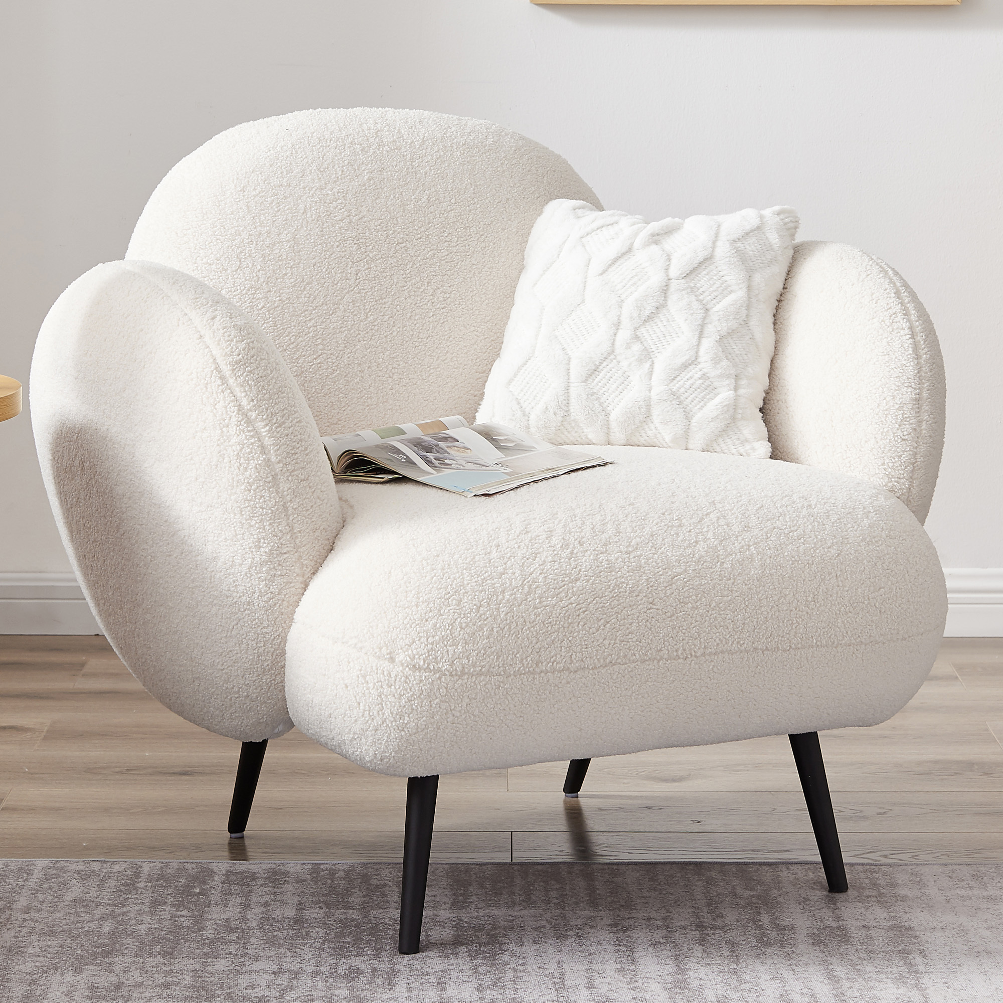 boucle armchair and footstool