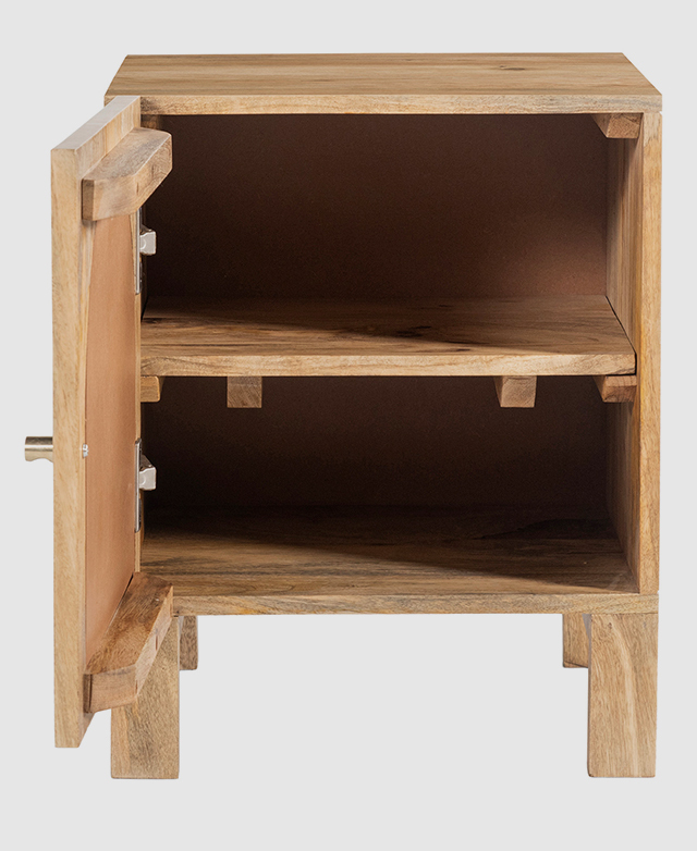 The door of a mango wood side table is open, revealing two spacious shelves inside.