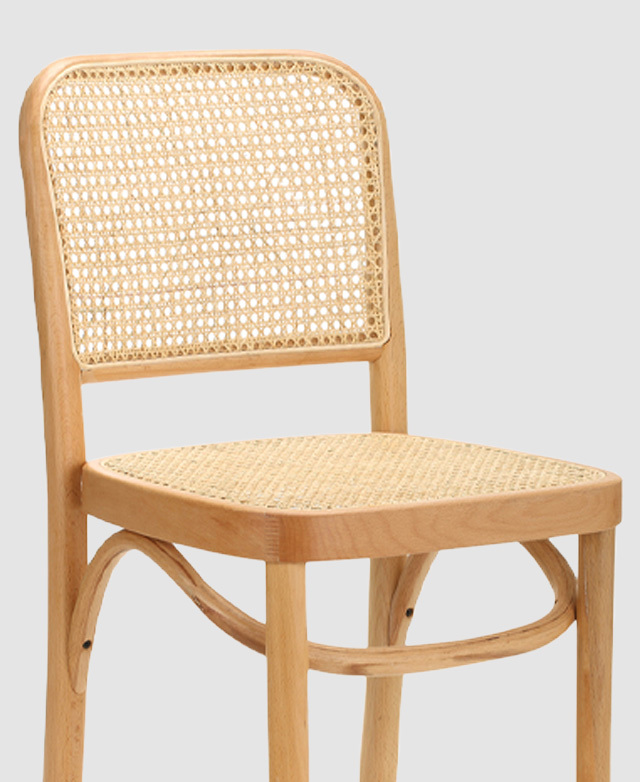 The rattan seat & backrest are in the shot. The smooth timber frame and the bentwood seat support display its honey tones. The rattan seat & backrest are in the shot. The smooth timber frame and the bentwood seat support display its honey tones.