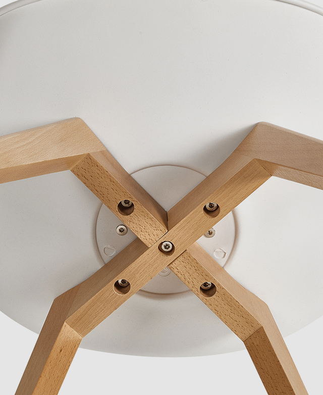 The angle of the underside of the chair shows the legs attached to the seat.