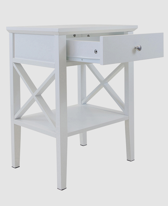 Painted in a matte white finish, the versatile side table maintains a fresh and simple appearance that's easy to style with.