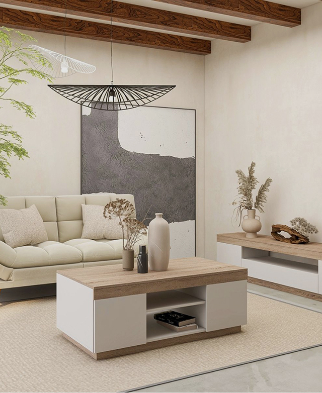In a rustic-meets-coastal living room, the TV unit is styled near a coordinating coffee table. In a rustic-meets-coastal living room, the TV unit is styled near a coordinating coffee table.
