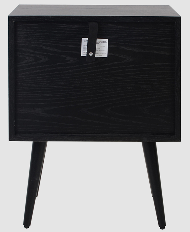 The back of a black oak veneer side table. A white fabric anchor strap is attached directly underneath the table top.