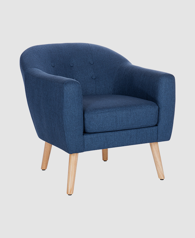 The three-quarter angle shows the chair's curved edges, deep seat, and smooth, tapered timber legs. The three-quarter angle shows the chair's curved edges, deep seat, and smooth, tapered timber legs.