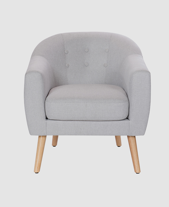 The front-facing chair in its grey iteration shows off the button tufting on the backrest & the smooth lines of its frame. The front-facing chair in its grey iteration shows off the button tufting on the backrest & the smooth lines of its frame.