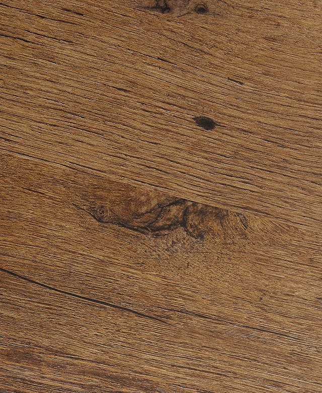 Large-scale view of the medium timber finish of an executive desk, with a straight wood grain and unique knots and whorls. Large-scale view of the medium timber finish of an executive desk, with a straight wood grain and unique knots and whorls.