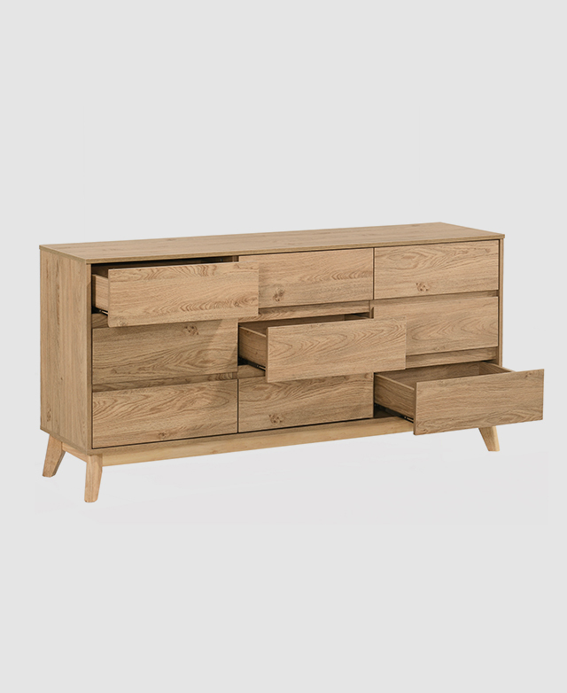 Three-quarter angle displays the chest with three drawers open diagonally.