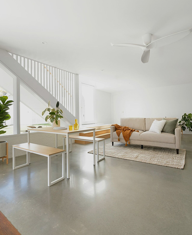 The three-piece set is styled adjacent to a sofa and rug in a bright, open-plan living space. The three-piece set is styled adjacent to a sofa and rug in a bright, open-plan living space.