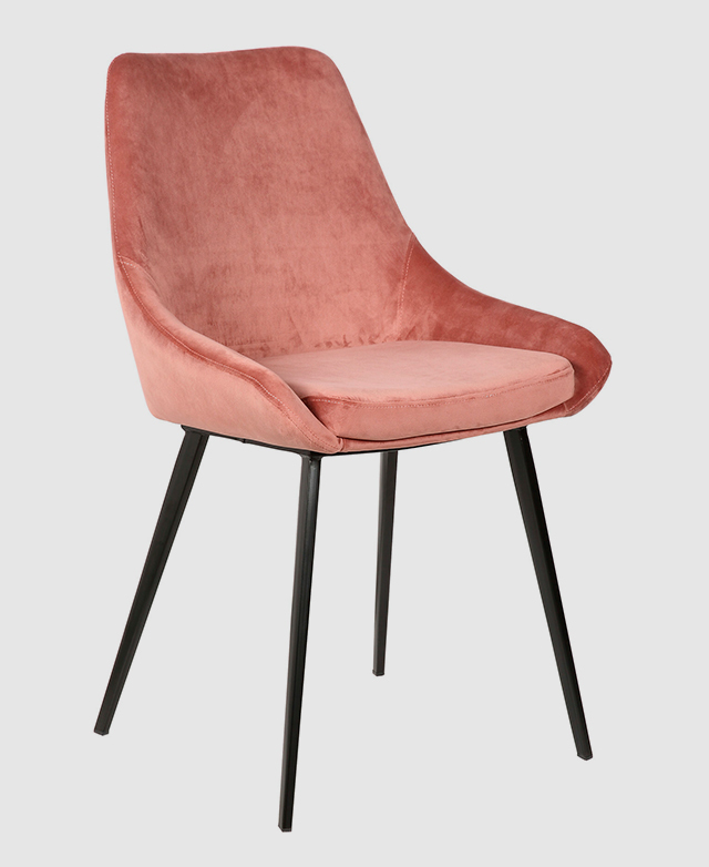 A three-quarter angle of the full chair displays the blush varietal, including its low armrests and splayed legs.